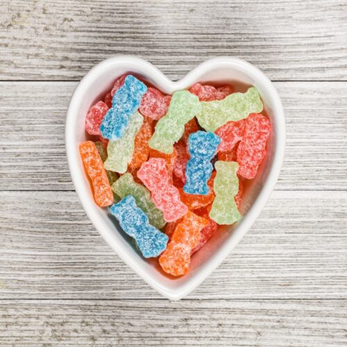 heart shaped bowl with sour lollies